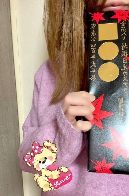 セーターと日光フード